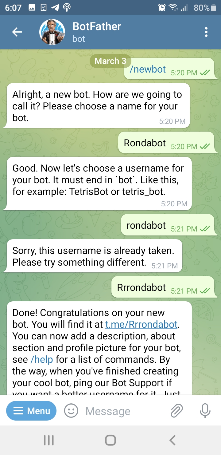 English BotFather chat rejecting an occupied username and accepting a different one
